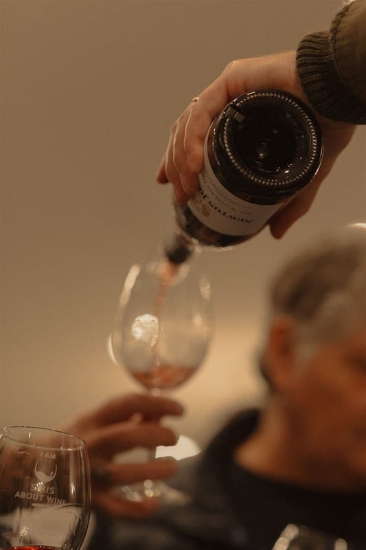 Wine being poured at a tasting